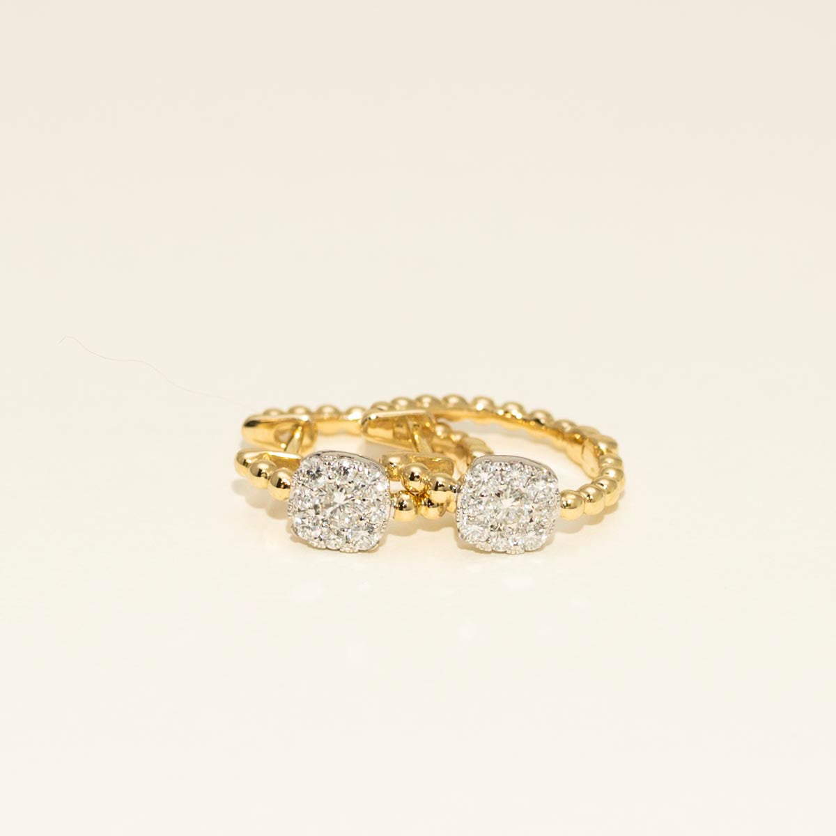 Diamond Hoop Earrings in 14kt Yellow and White Gold (3/8ct tw)