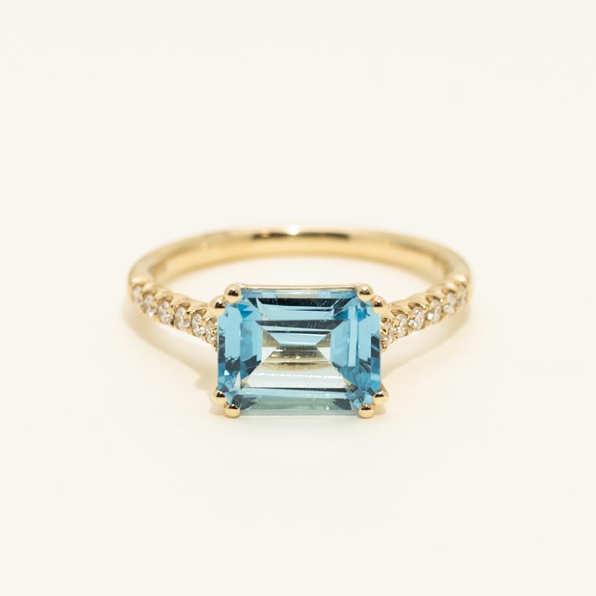 Madison L Essentials Emerald Cut Blue Topaz Ring in 14kt Yellow Gold with Diamonds (1/7ct tw)