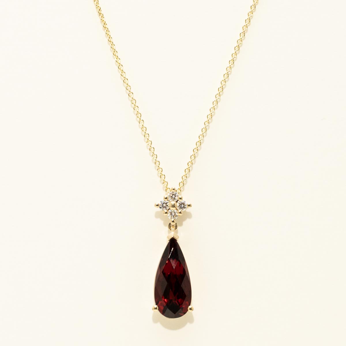 Pear Shaped Garnet Necklace in 14kt Yellow Gold with Diamonds (1/10ct tw)