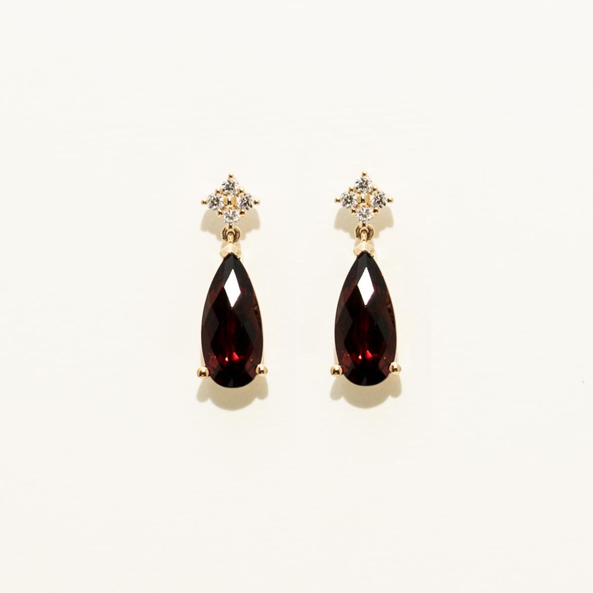 Pear Shaped Garnet Drop Earrings in 14kt Yellow Gold with Diamonds (1/10ct tw)