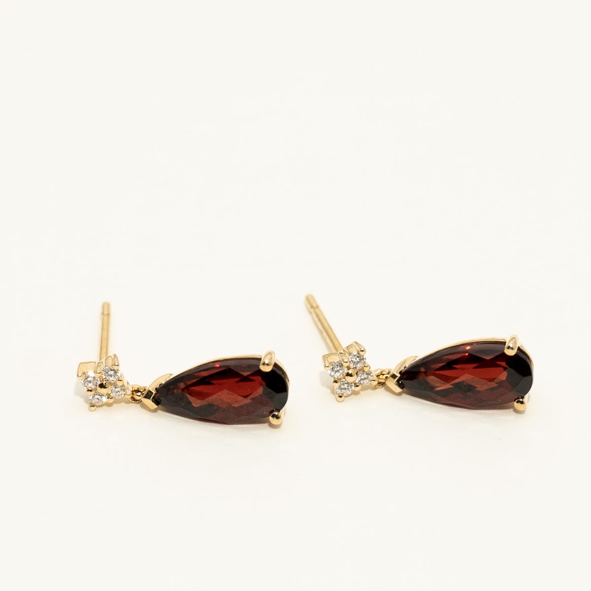 Pear Shaped Garnet Drop Earrings in 14kt Yellow Gold with Diamonds (1/10ct tw)