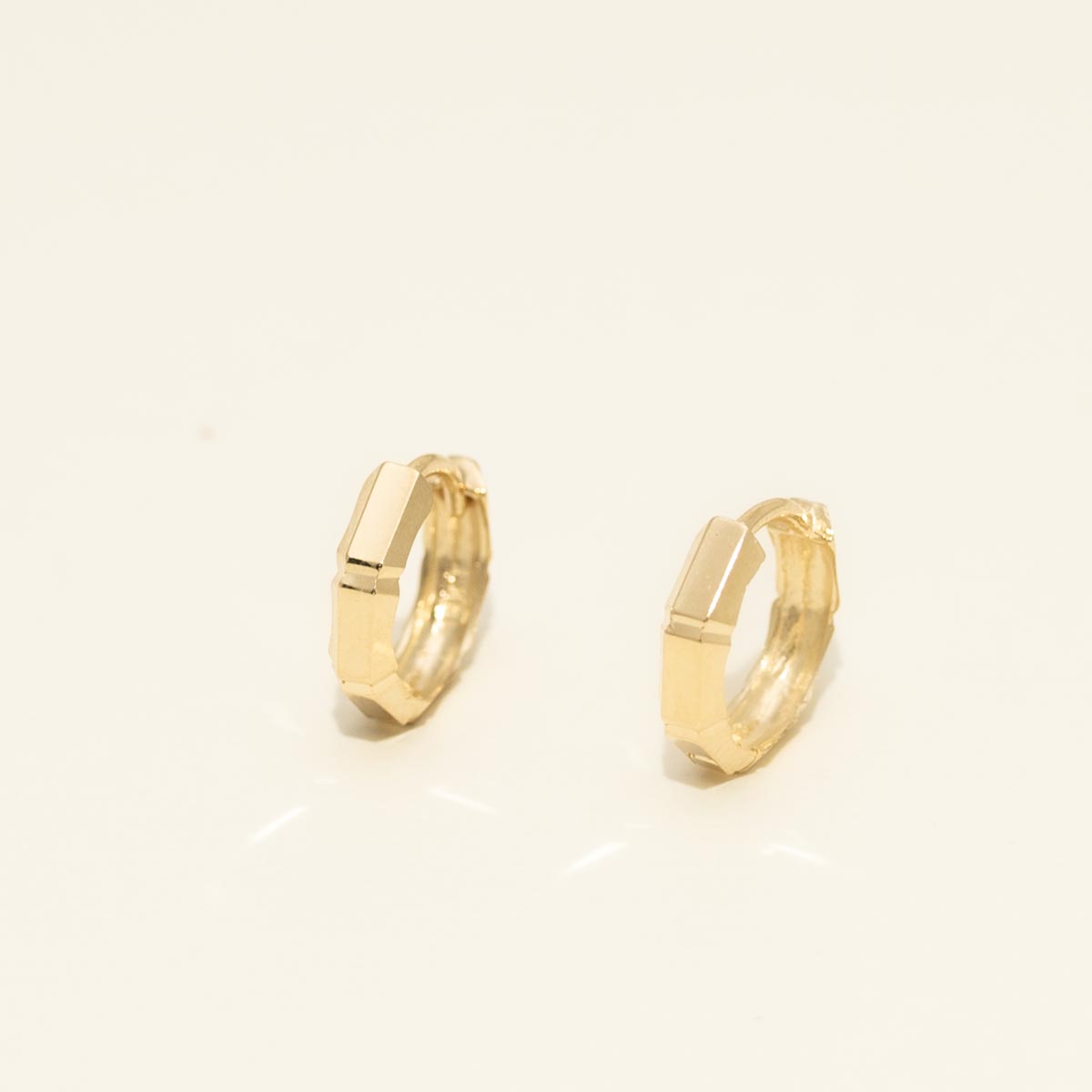 Diamond Cut Huggie Hoop Earrings in 14kt Yellow Gold