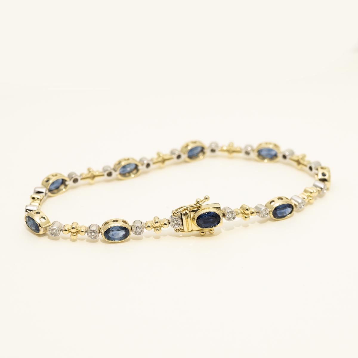 Dabakarov Oval Sapphire Bracelet in 14kt Yellow and White Gold with Diamonds (1/3ct tw)