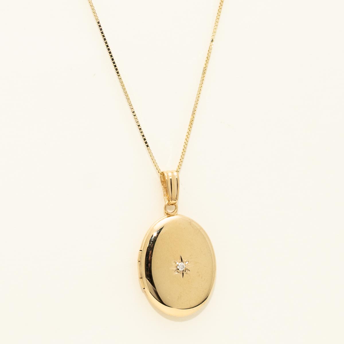 Oval Locket Necklace in 14kt Yellow Gold with Diamond (.02ct tw)