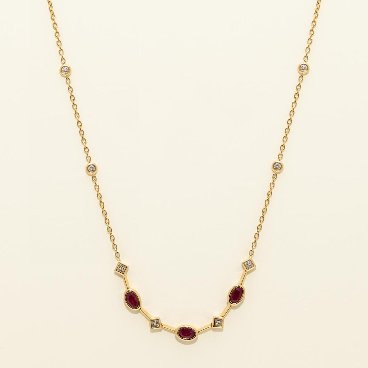 Oval Ruby Station Necklace in 18kt Yellow Gold with Princess Cut Diamonds (1/3ct tw)