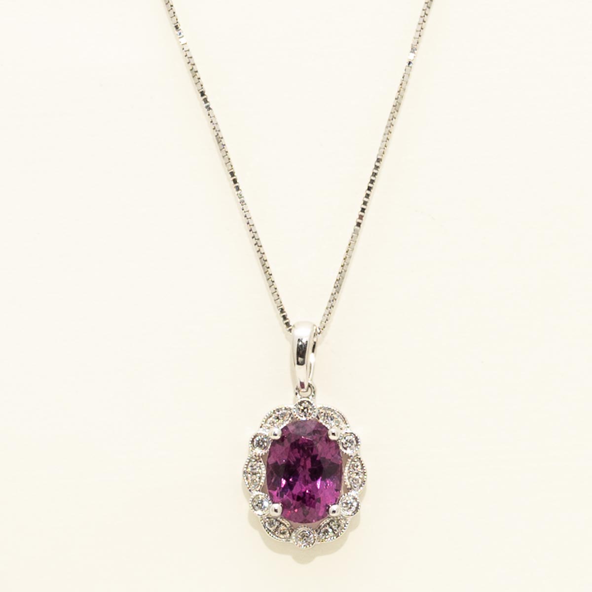 Oval Rhodolite Garnet Halo Necklace in 14kt White Gold with Diamonds (1/20ct tw)