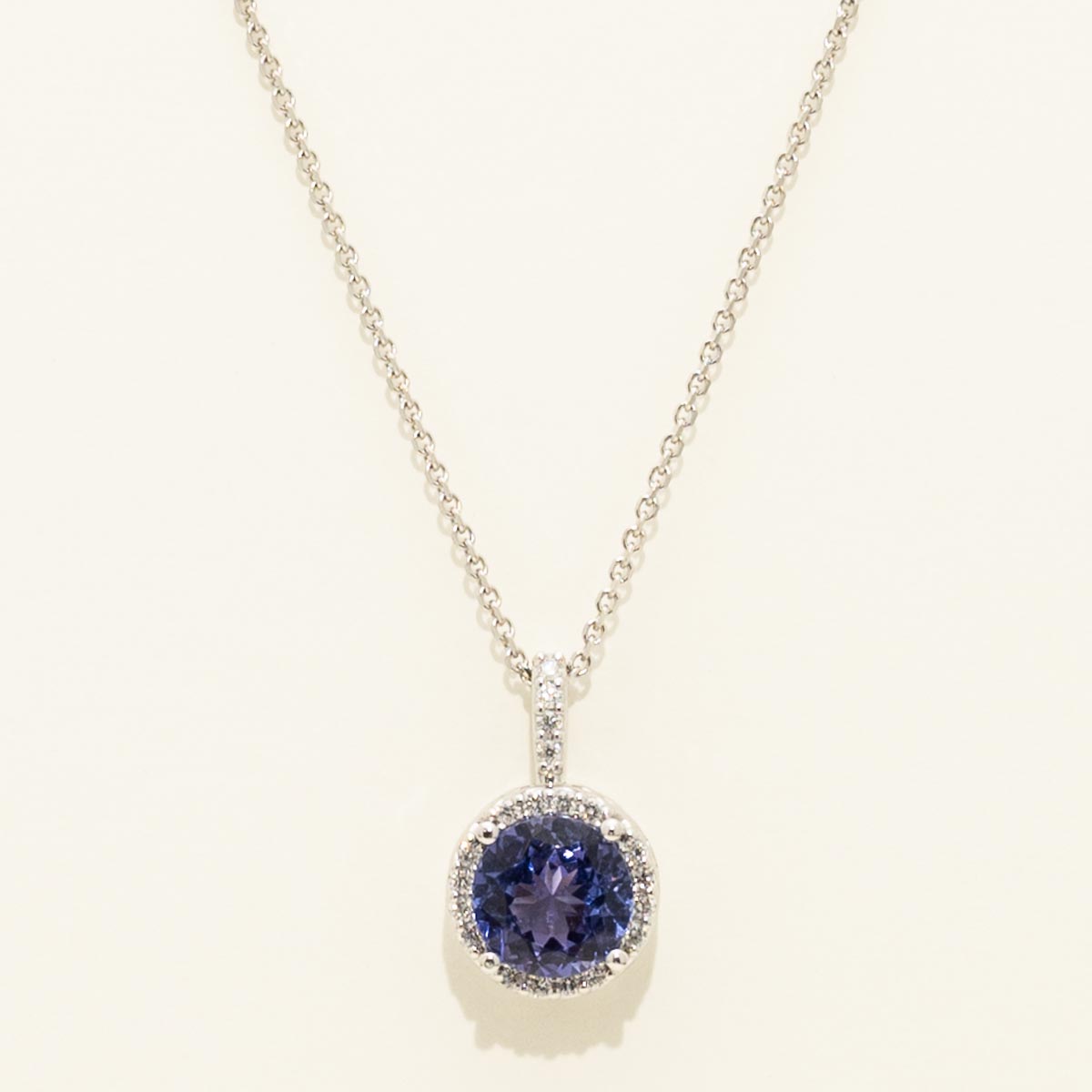 Tanzanite Halo Necklace in 14kt White Gold with Diamonds (1/10ct tw)