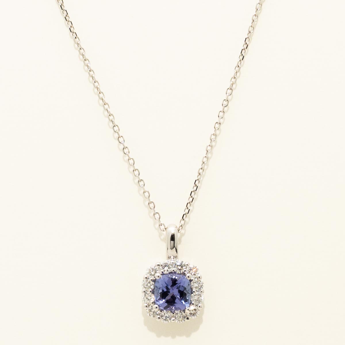 Cushion Cut Tanzanite Halo Necklace in 14kt White Gold with Diamonds (1/3ct tw)