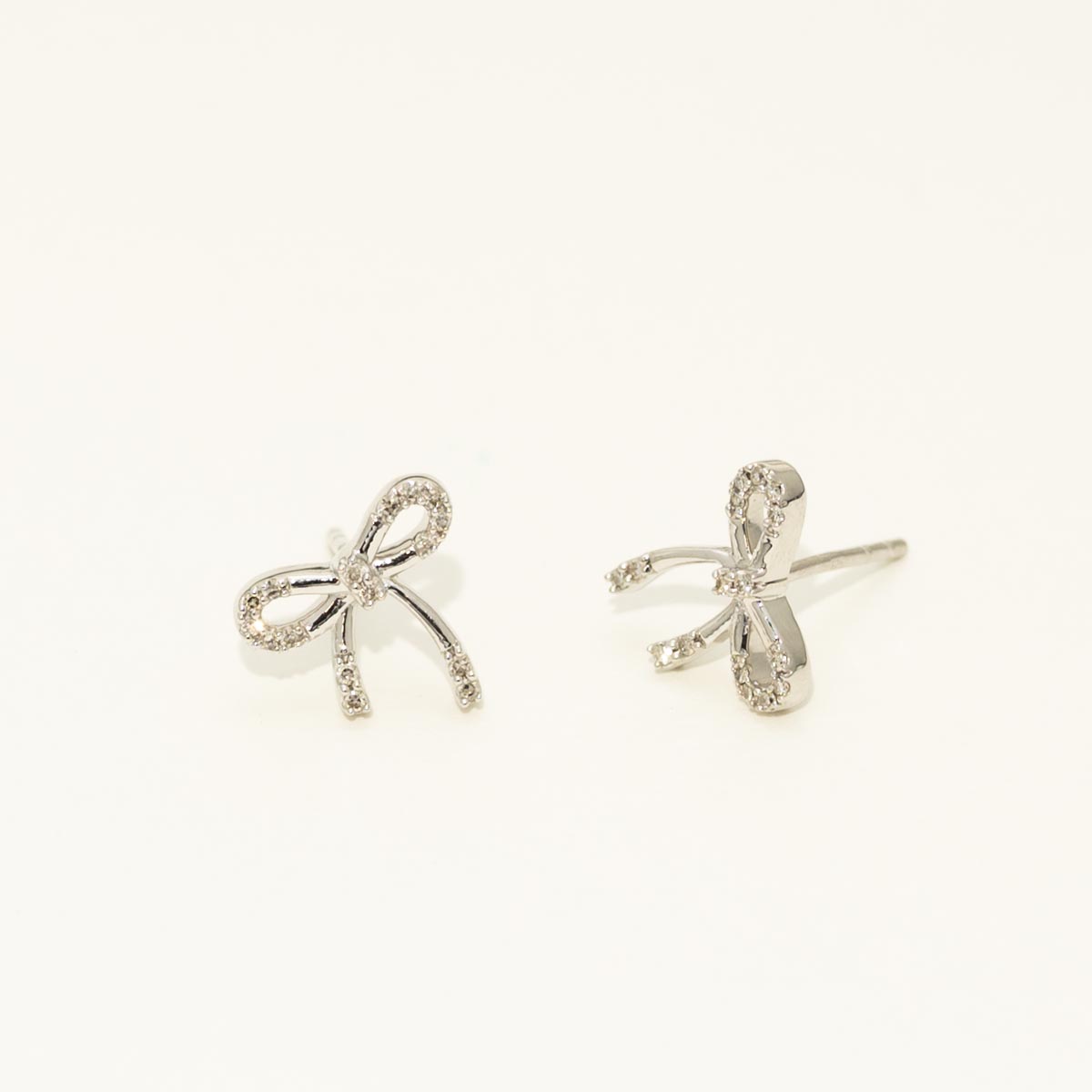 Bow Earrings in Sterling Silver with Diamonds (1/10ct tw)