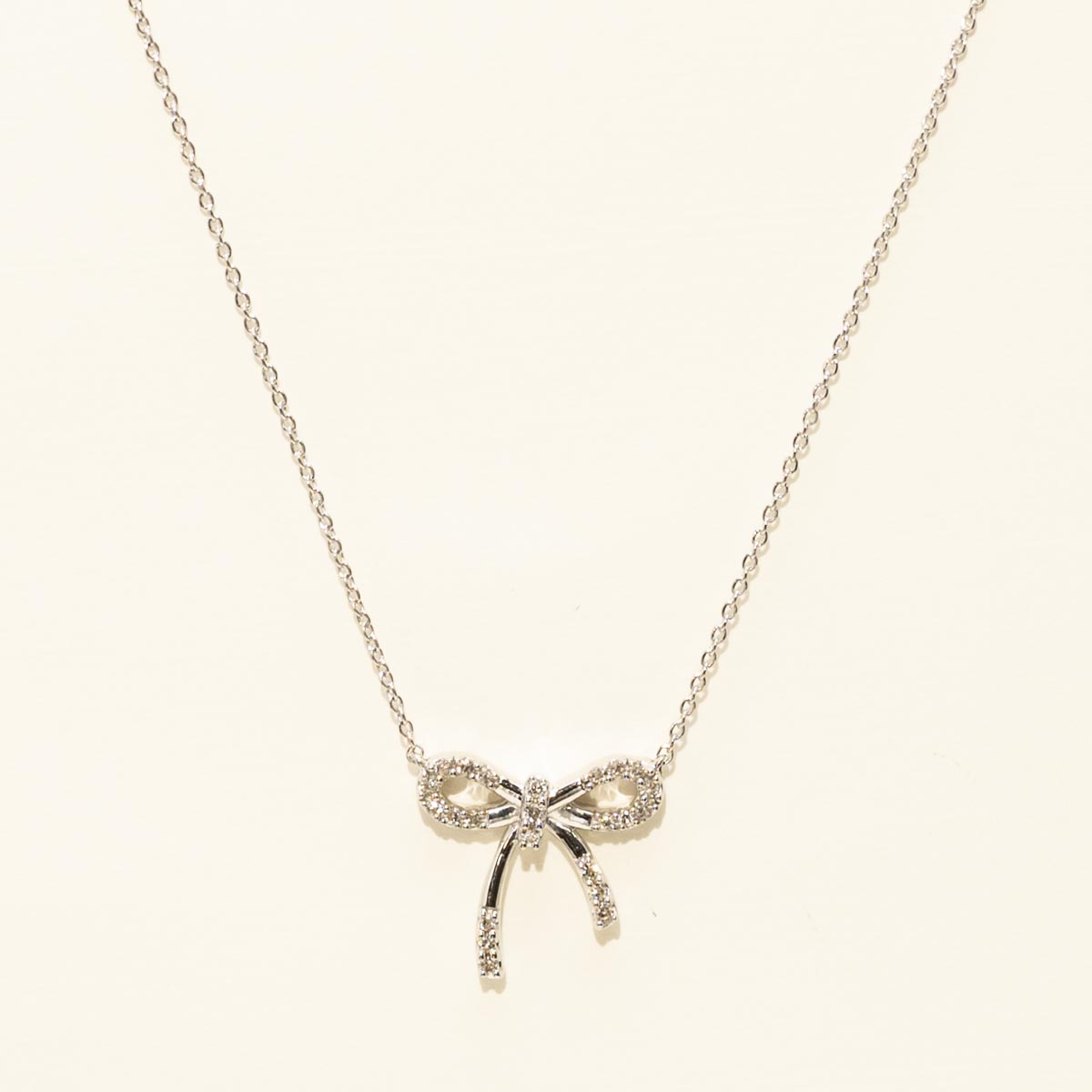 Bow Necklace in Sterling Silver with Diamonds (1/10ct tw)