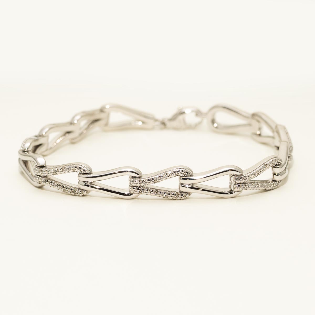 Bold Knot Link Fashion Bracelet in Sterling Silver with Diamonds (1/7ct tw)