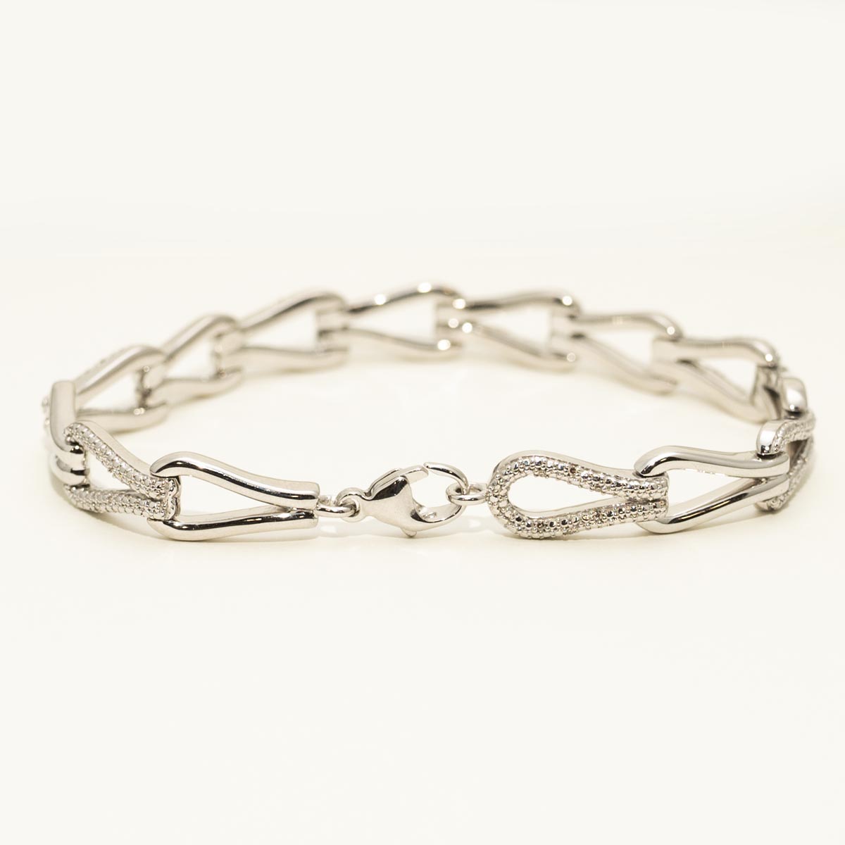 Bold Knot Link Fashion Bracelet in Sterling Silver with Diamonds (1/7ct tw)