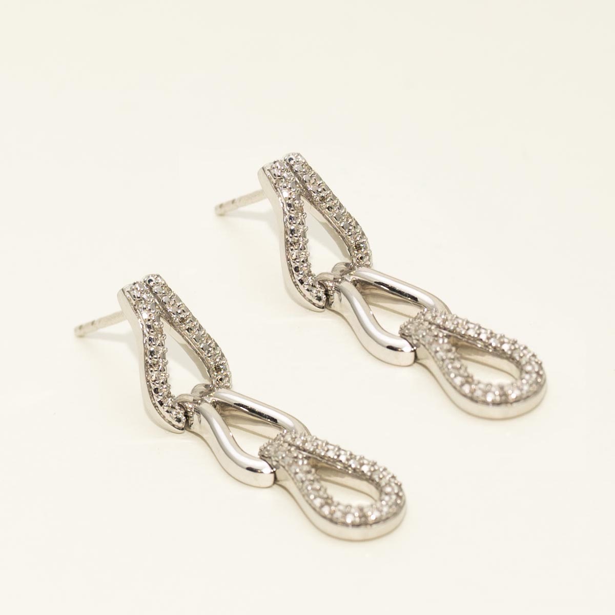 Bold Knot Drop Earrings in Sterling Silver with Diamonds (1/10ct tw)