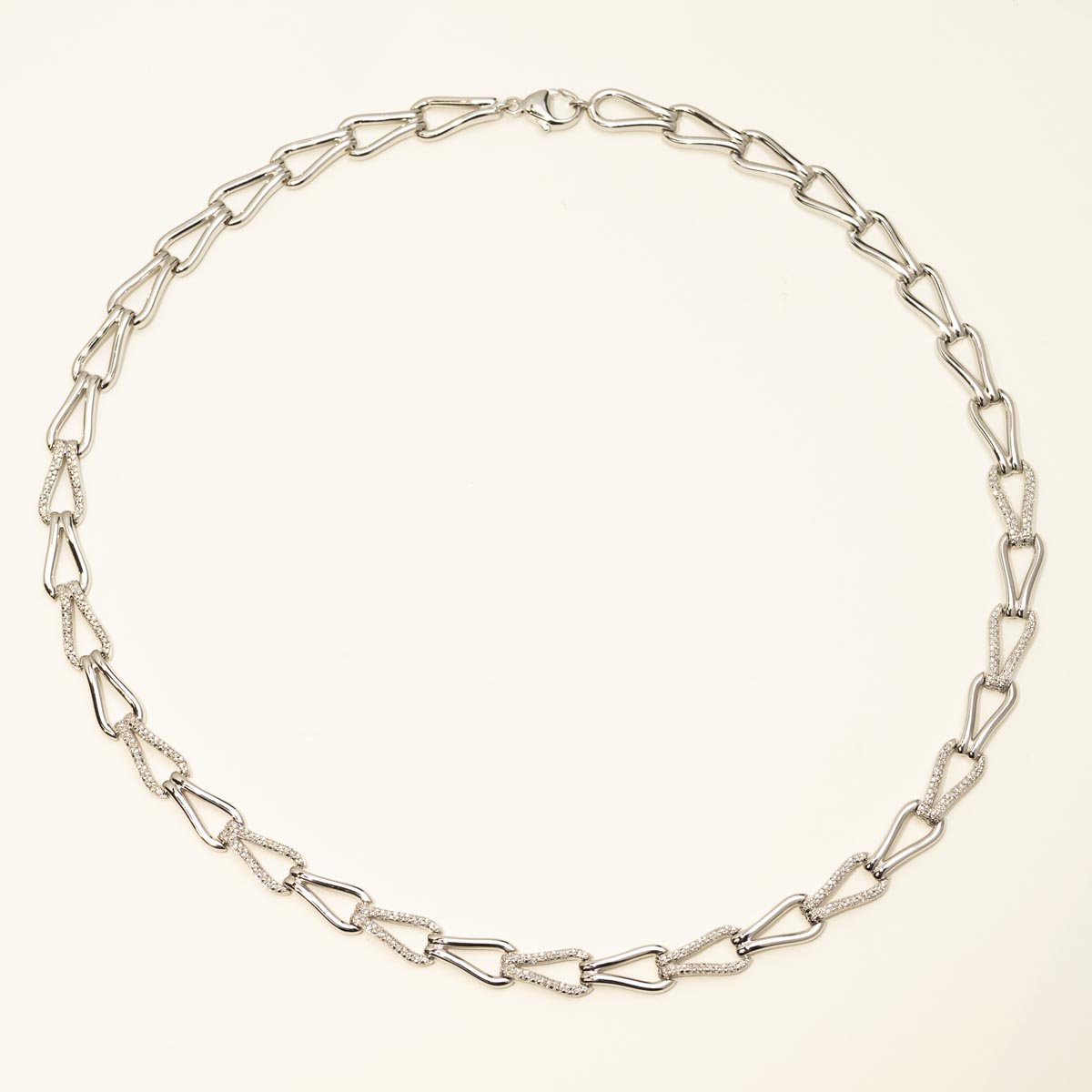 Bold Knot Fashion Necklace in Sterling Silver with Diamonds (1/4ct tw)