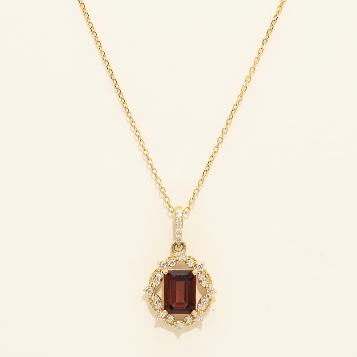Emerald Cut Garnet Necklace in 14kt Yellow Gold with Diamonds (1/5ct tw)