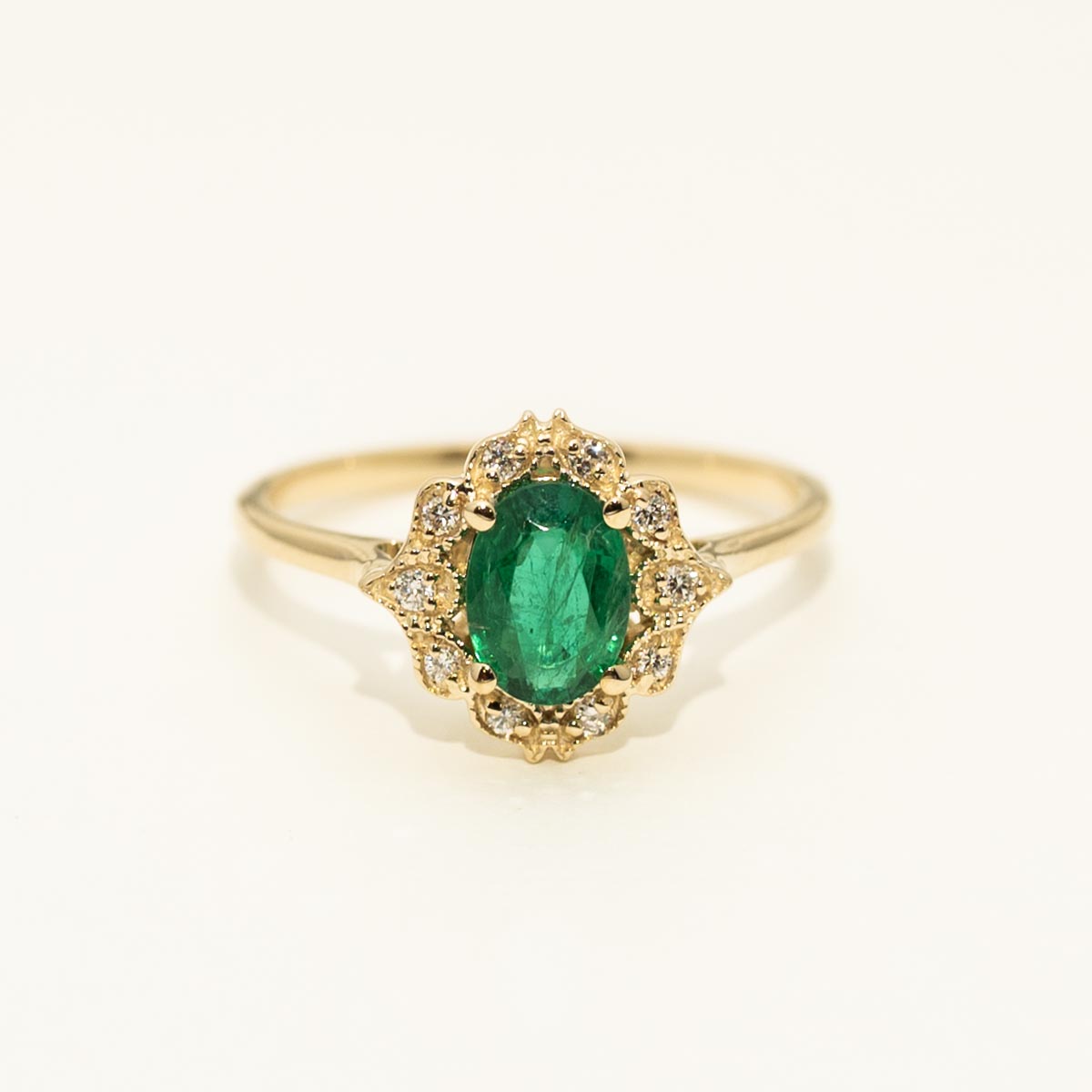 Oval Emerald Ring in 14kt Yellow Gold with Diamonds (1/20ct tw)