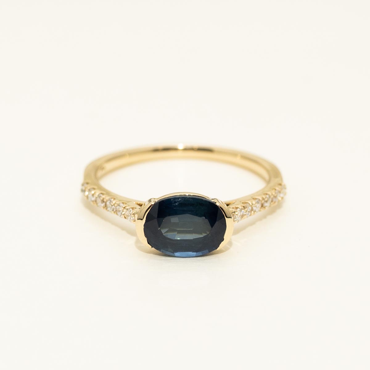 Oval Sapphire East West Ring in 14kt Yellow Gold with Diamonds (1/7ct tw)