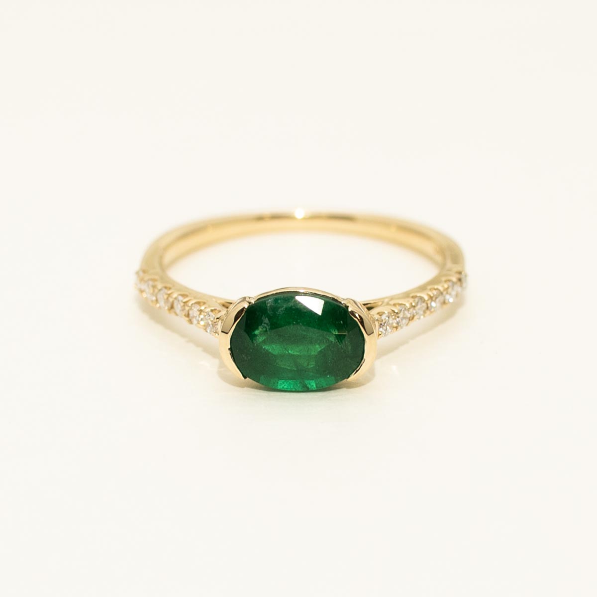 Oval Emerald East West Ring in 14kt Yellow Gold with Diamonds (1/7ct tw)
