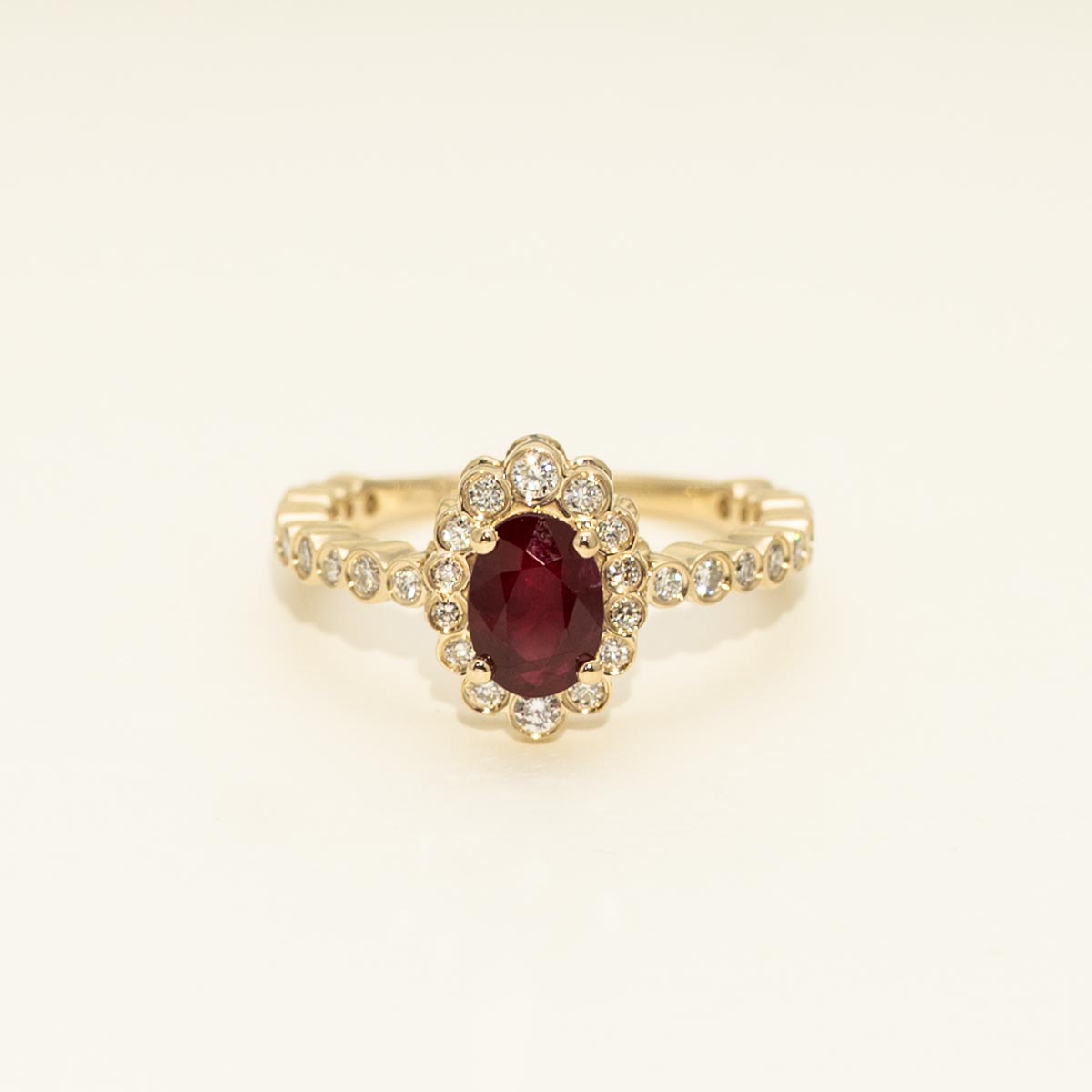 Oval Ruby Halo Ring in 14kt Yellow Gold with Diamonds (3/8ct tw)