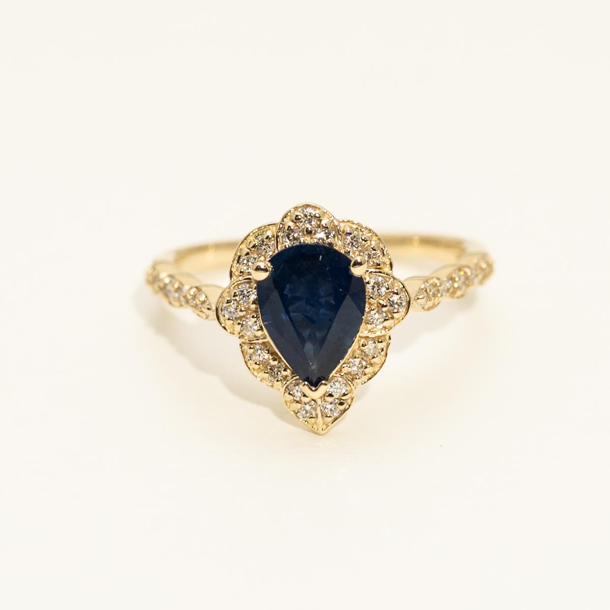 Pear Shaped Sapphire Halo Ring in 14kt Yellow Gold with Diamonds (1/4ct tw)