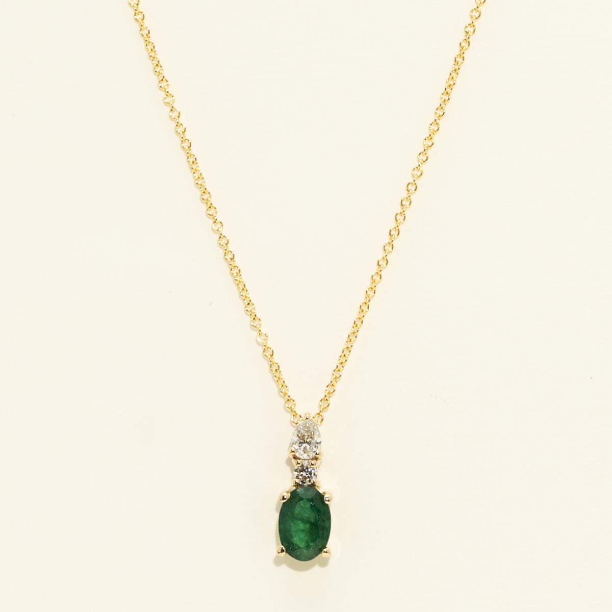 Oval Emerald Necklace in 14kt Yellow Gold with Diamonds (1/5ct tw)
