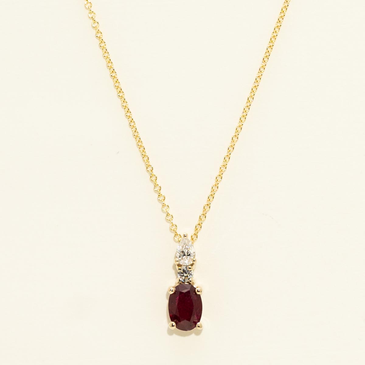 Oval Ruby Necklace in 14kt Yellow Gold with Diamonds (1/5ct tw)