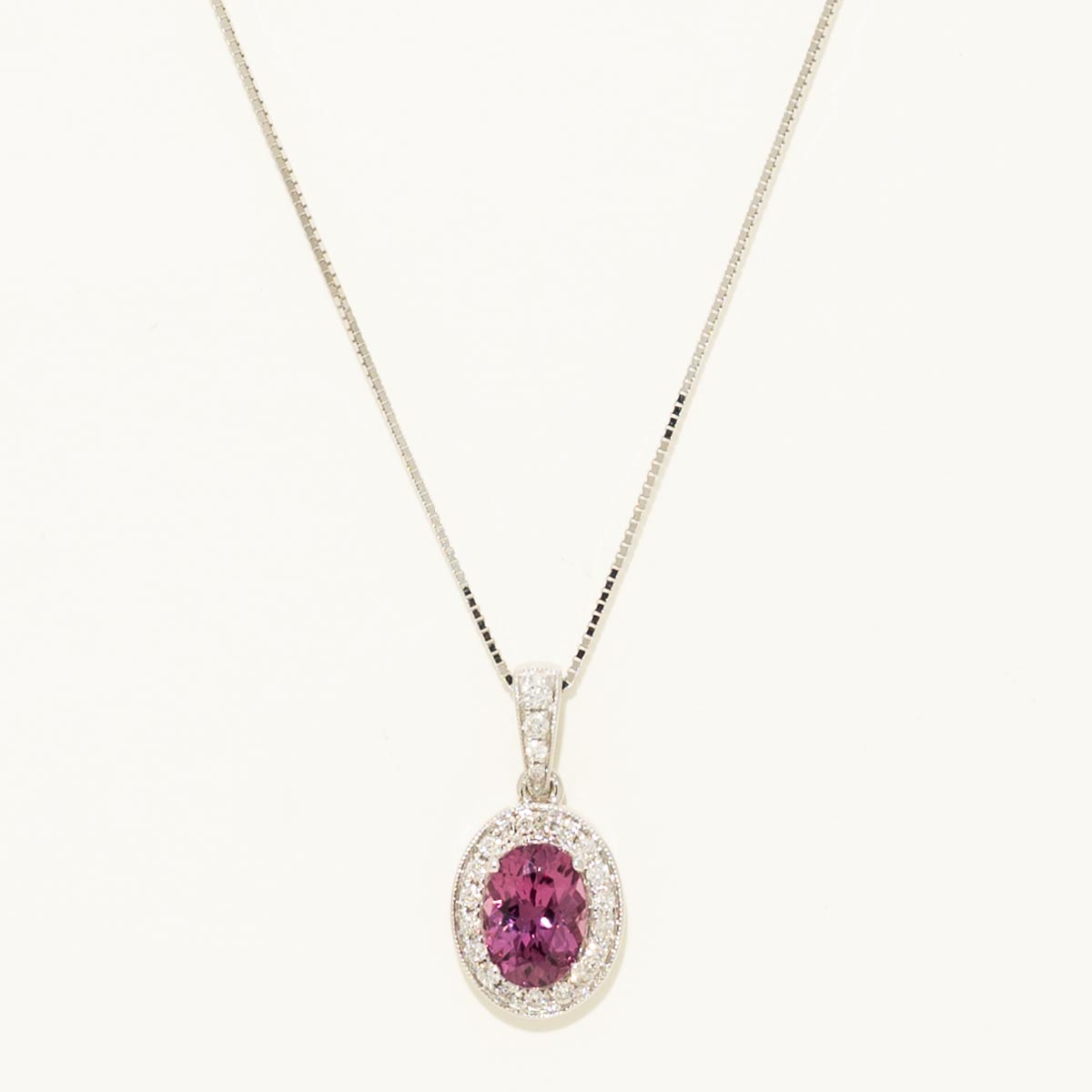 Oval Rhodolite Garnet Halo Necklace in 14kt White Gold (1/7ct tw)