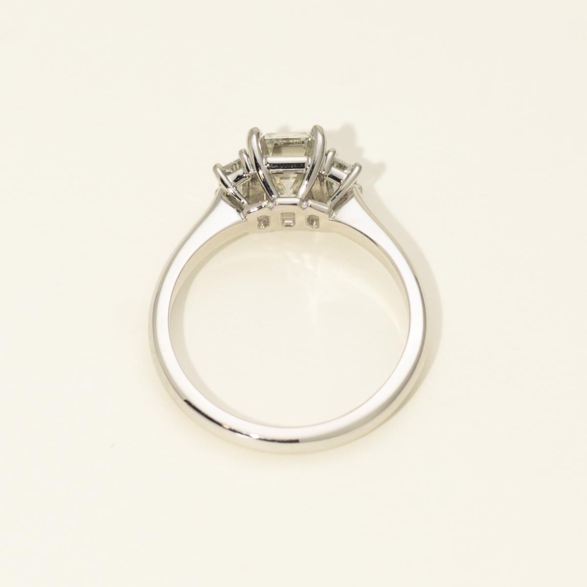 Emerald and Trapezoid Three Stone Diamond Engagement Ring in Platinum (1 7/8ct tw)