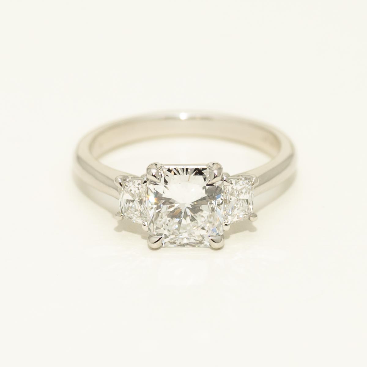 Radiant and Trapezoid Three Stone Diamond Engagement Ring in Platinum (2ct tw)