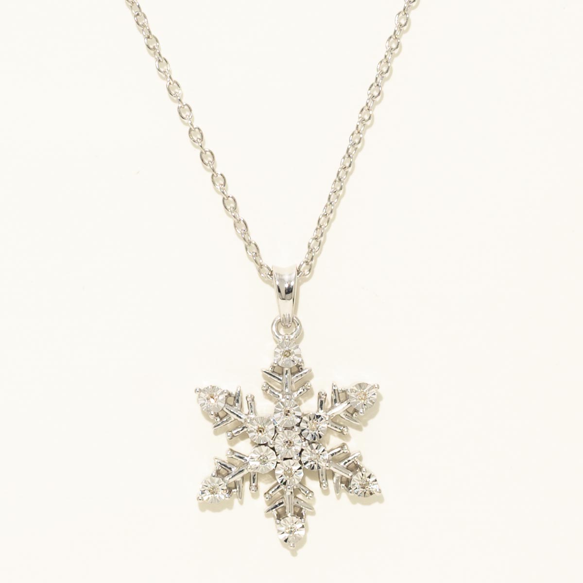 Diamond Snowflake Necklace in Sterling Silver (1/20ct tw)