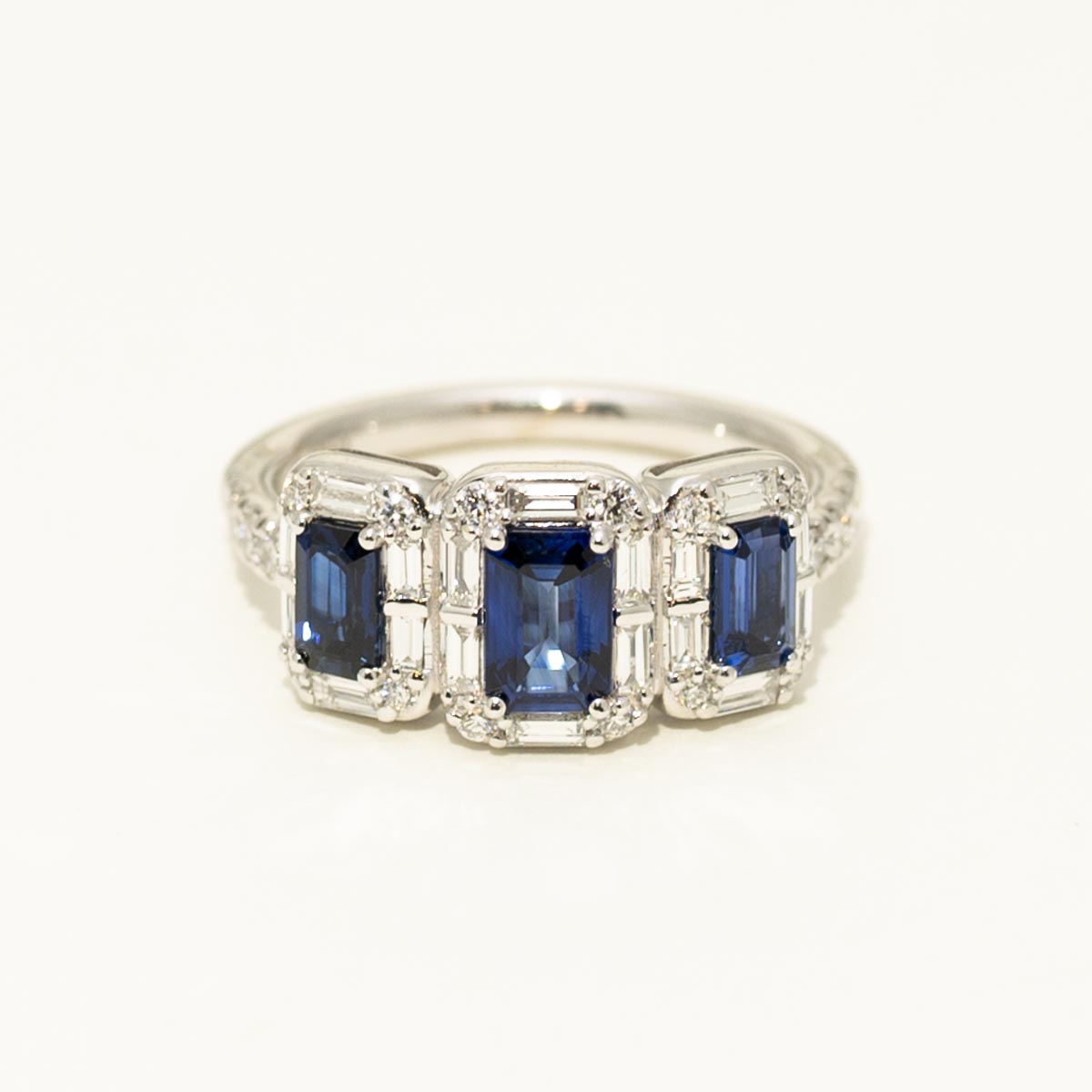 Three Stone Sapphire Halo Ring in 18kt White Gold (5/8ct tw)