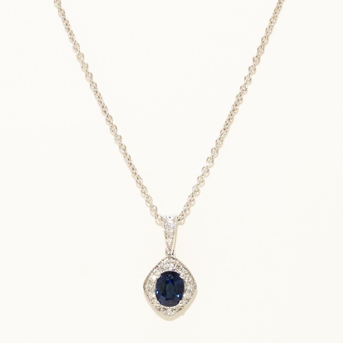 Oval Sapphire Halo Necklace in 14kt White Gold with Diamonds (1/10ct tw)