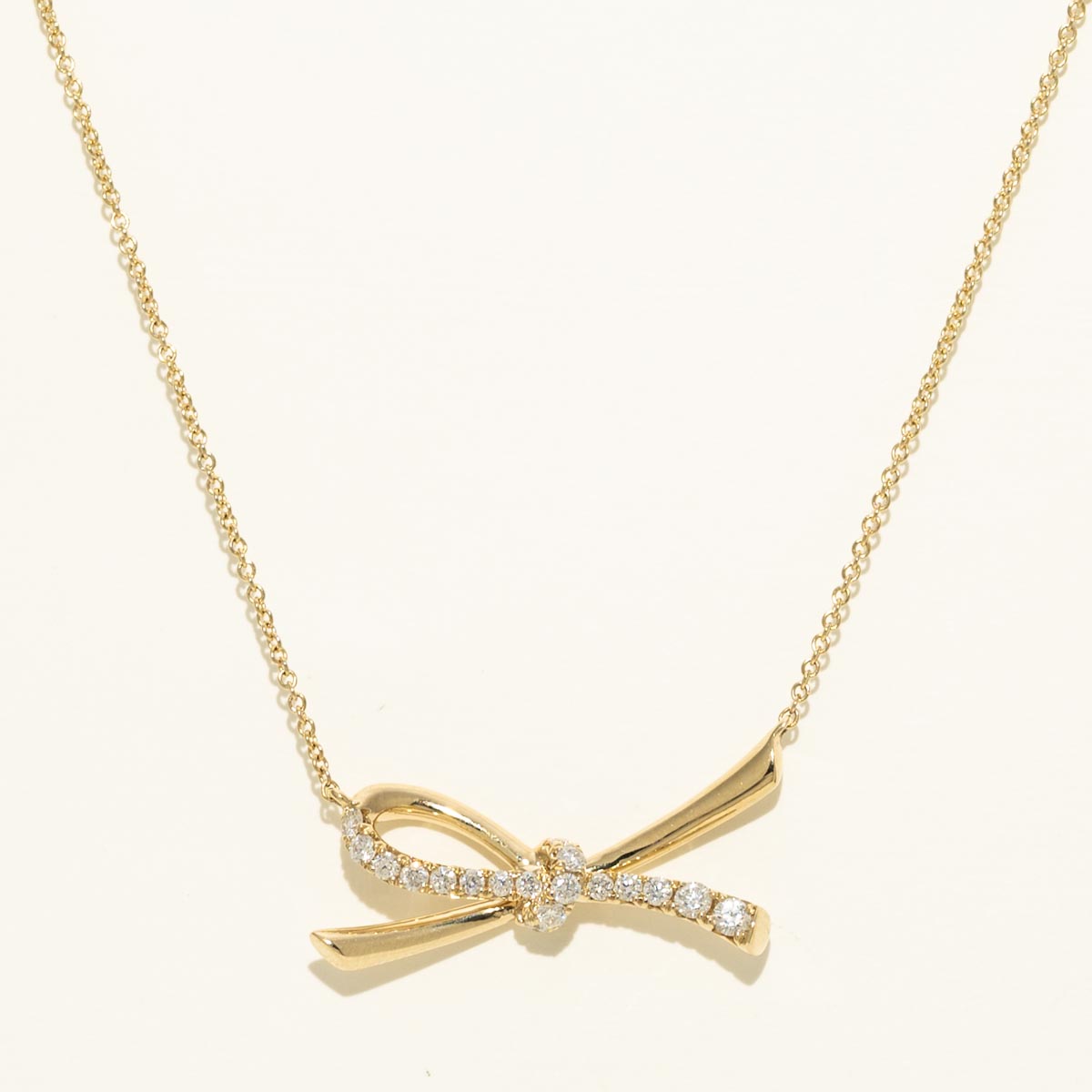 Diamond Bow Necklace in 14kt Yellow Gold (1/4ct tw)