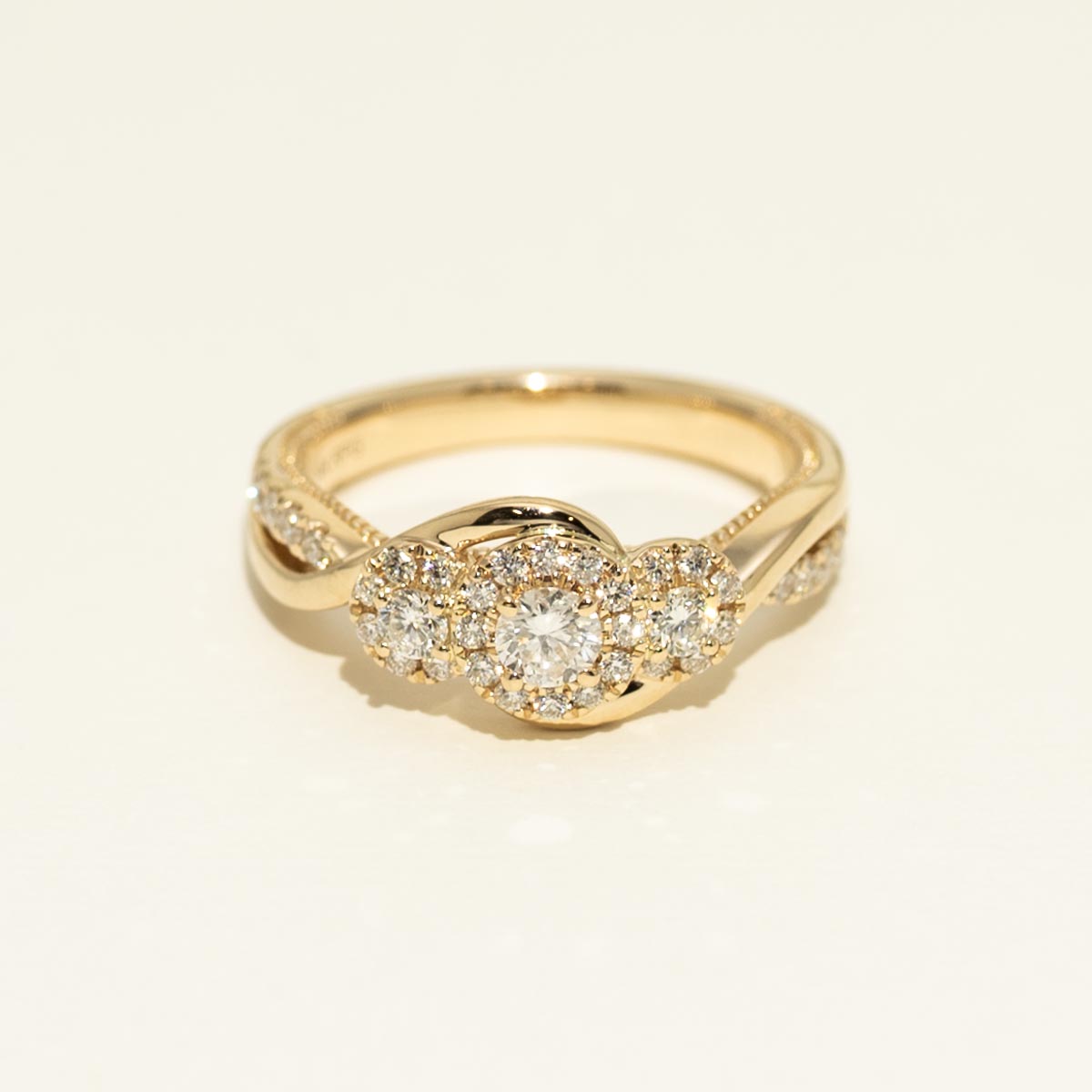 Three Stone Diamond Halo Engagement Ring in 14kt Yellow Gold (5/8ct tw)