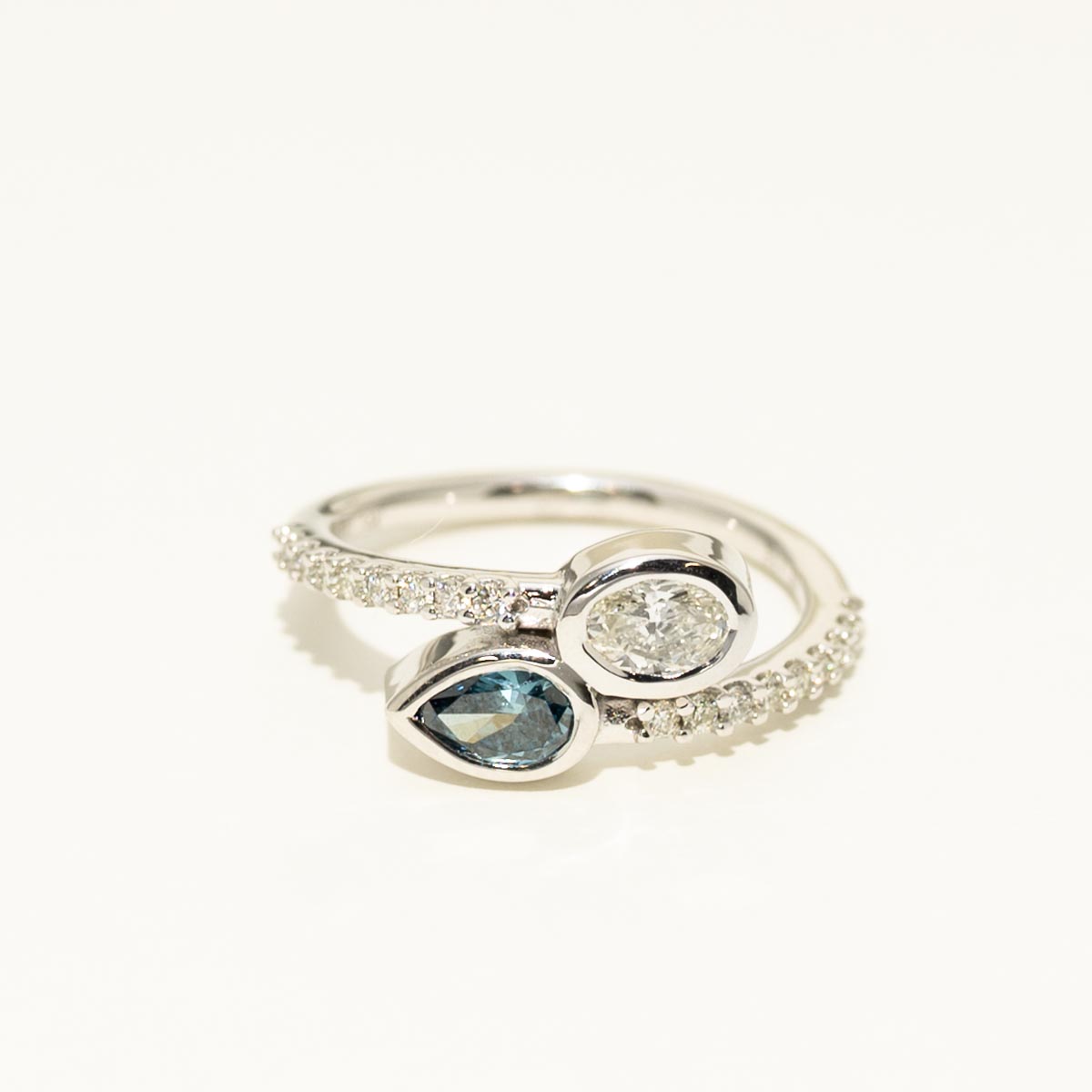 Oval White Diamond and Pear Shaped Blue Diamond Bypass Ring in 14kt White Gold (3/4ct tw)