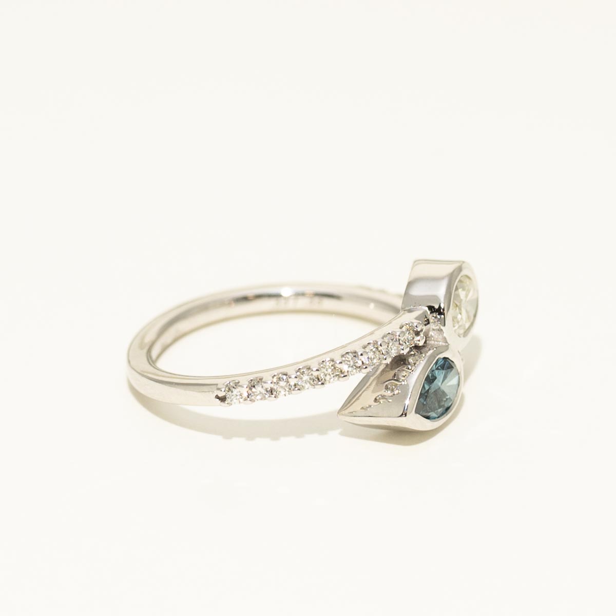 Oval White Diamond and Pear Shaped Blue Diamond Bypass Ring in 14kt White Gold (3/4ct tw)
