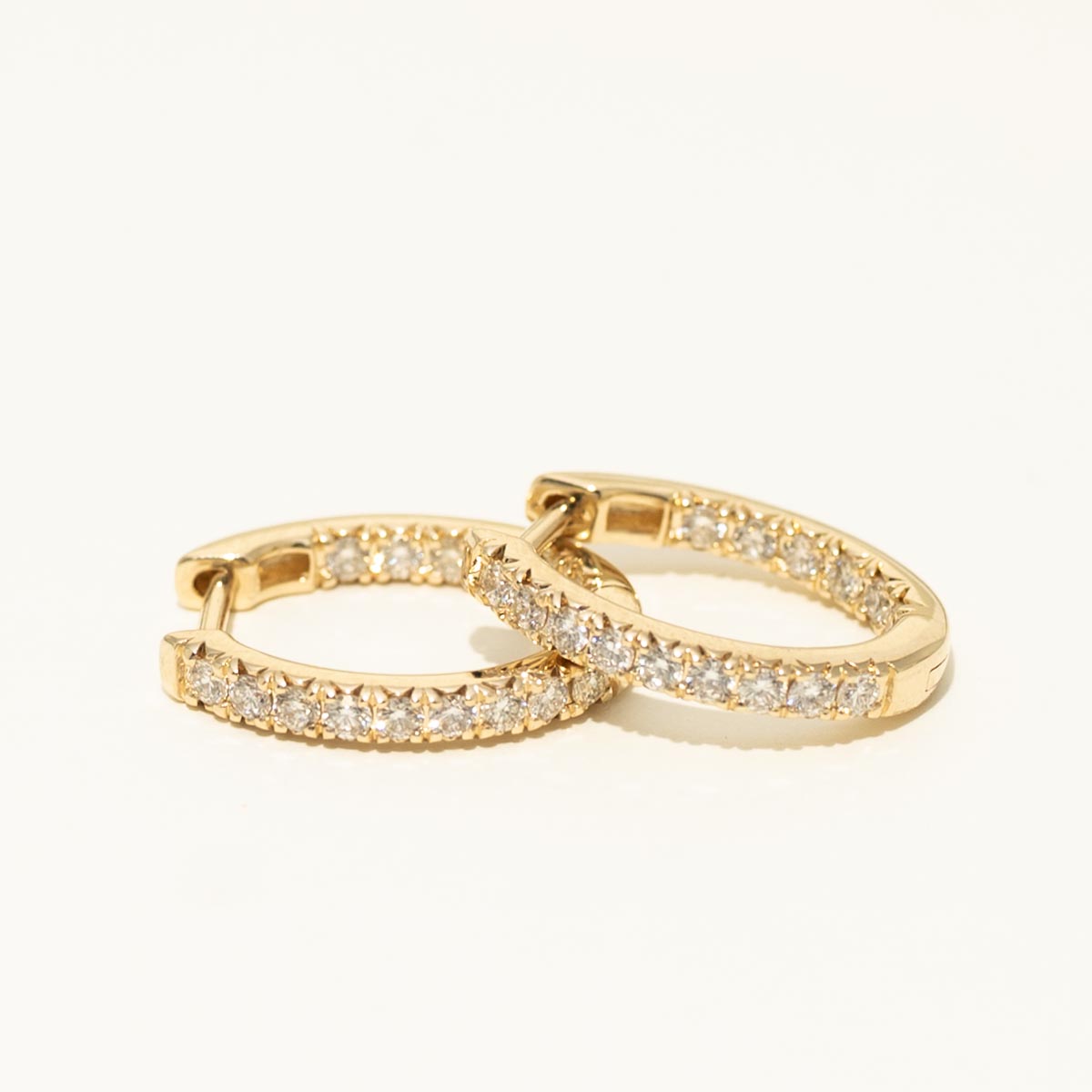 Diamond Oval Huggie Hoop Earrings in 14kt Yellow Gold (1/2ct tw)