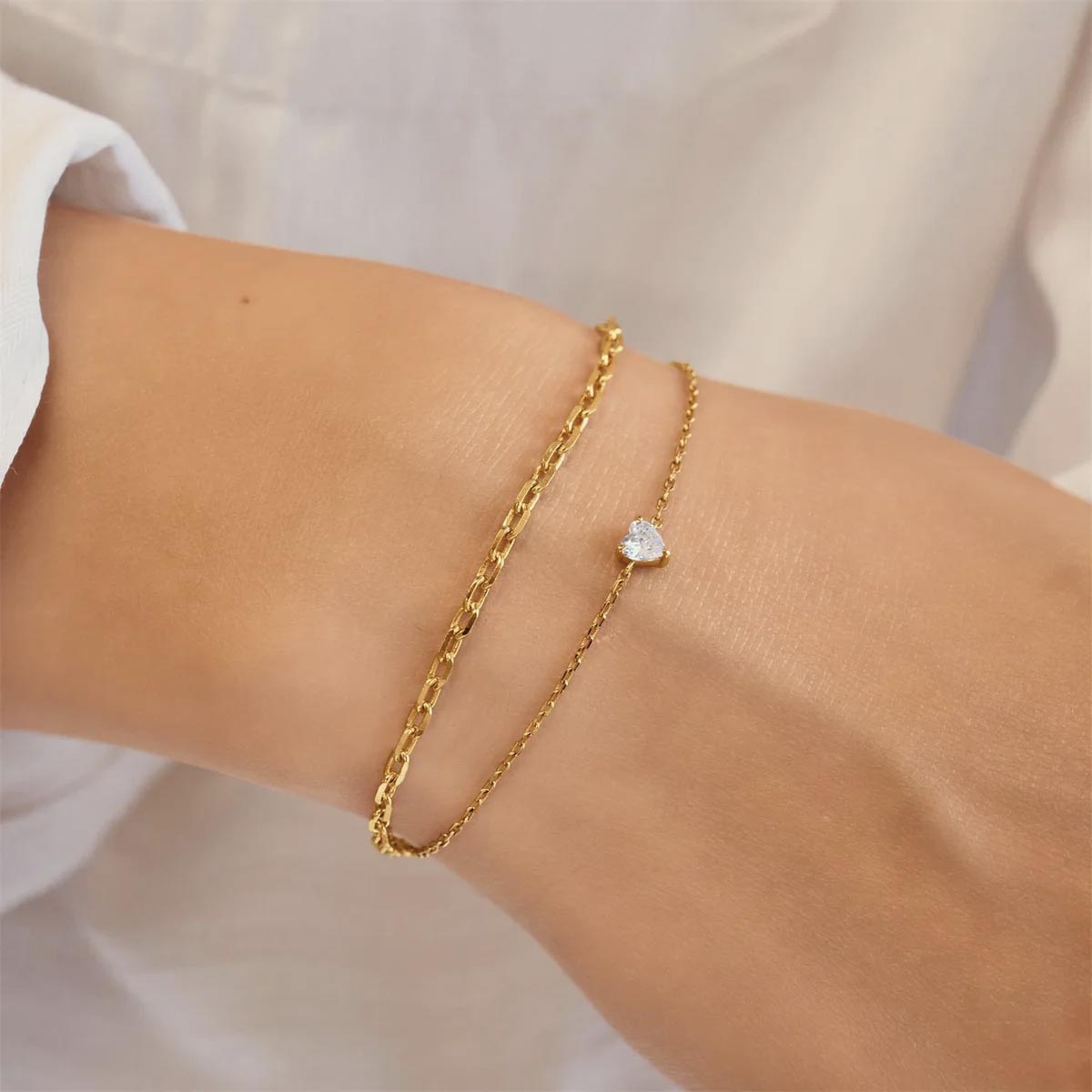 Ania Haie Heart Shape Cubic Zirconia Bracelet in Sterling Silver with 14kt Yellow Gold Plate