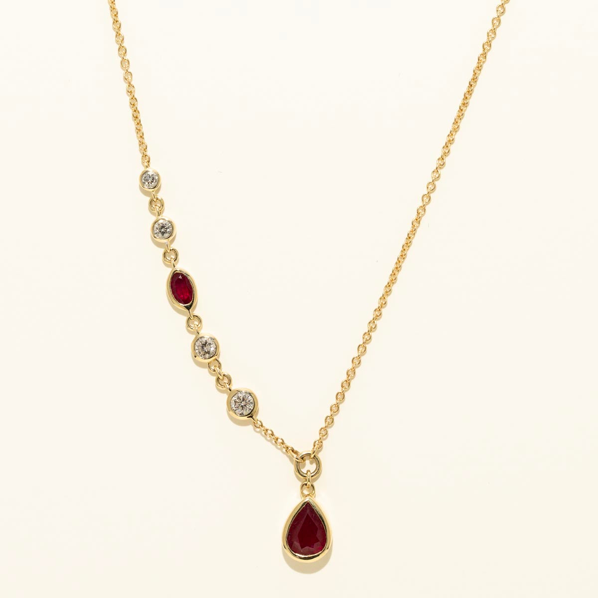 Pear Shaped Ruby Necklace in 14kt Yellow Gold with Diamonds (1/3ct tw)
