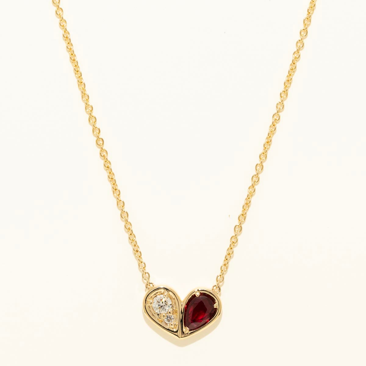 Pear Shaped Ruby Necklace in 14kt Yellow Gold with Diamonds (1/10ct tw)
