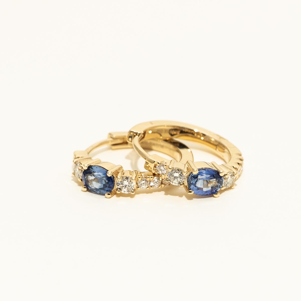 Oval Sapphire Hoop Earrings in 14kt Yellow Gold with Diamonds (3/8ct tw)