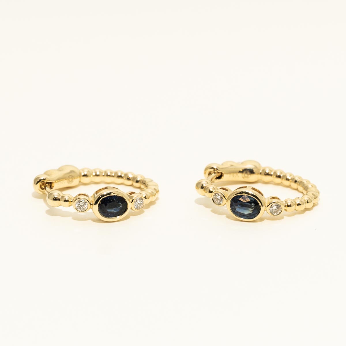 Oval Sapphire Hoop Earrings with Diamonds (1/10ct tw)