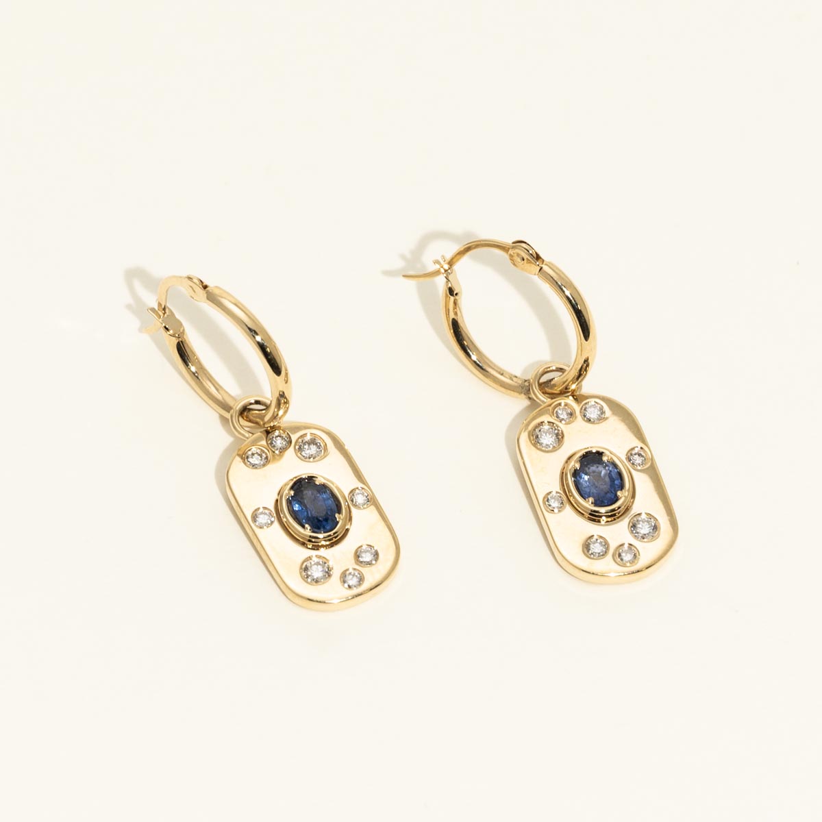 Oval Sapphire Drop Earrings in 14kt Yellow Gold with Diamonds (1/3ct tw)