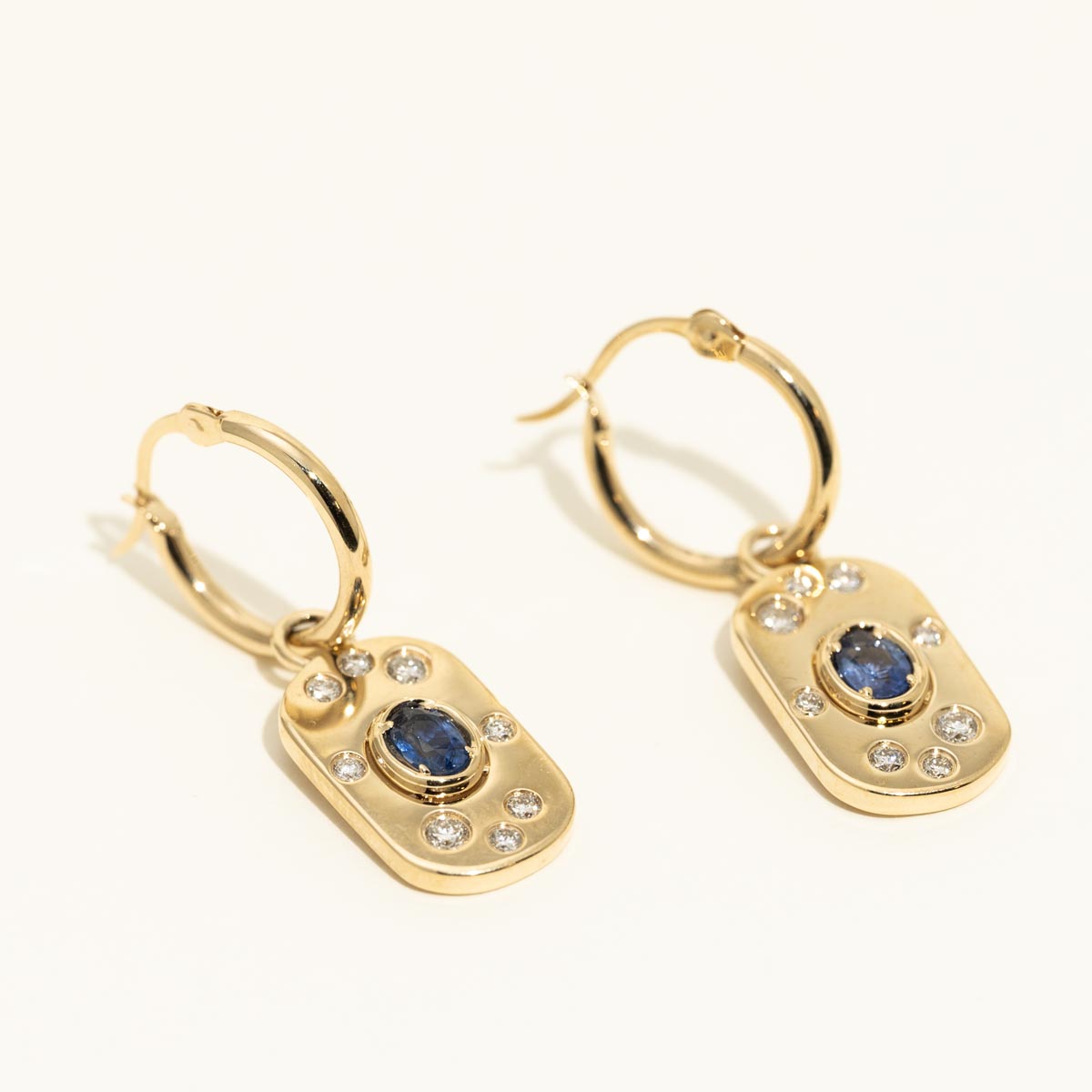 Oval Sapphire Drop Earrings in 14kt Yellow Gold with Diamonds (1/3ct tw)