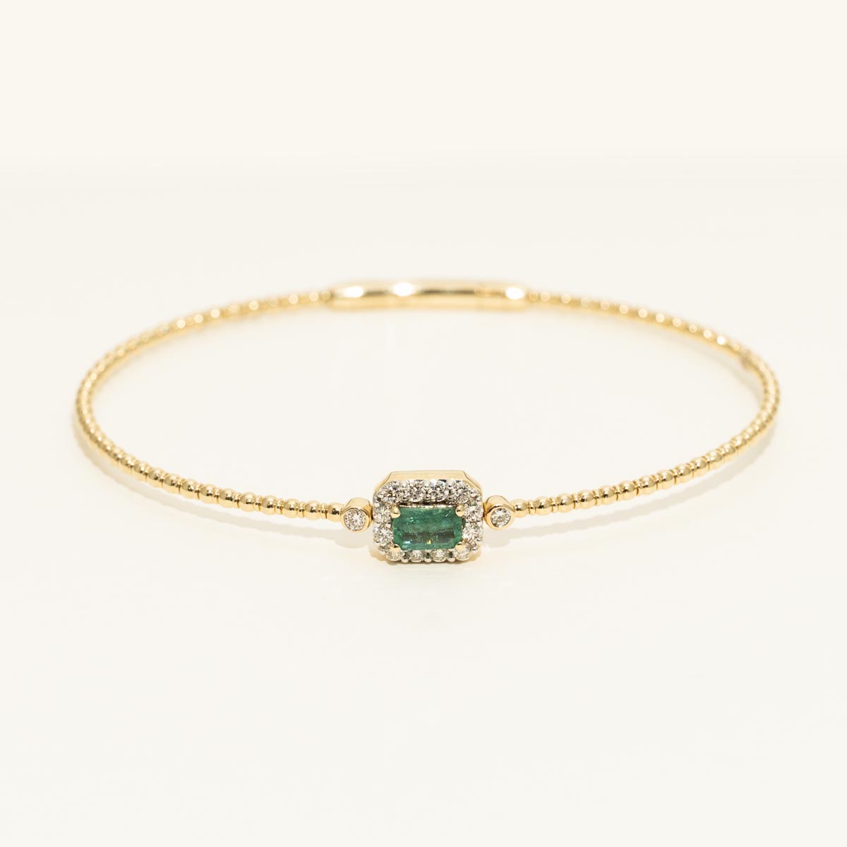 Emerald Cut Emerald Flexible Bangle Bracelet in 14kt Yellow Gold with Diamonds (1/3ct tw)