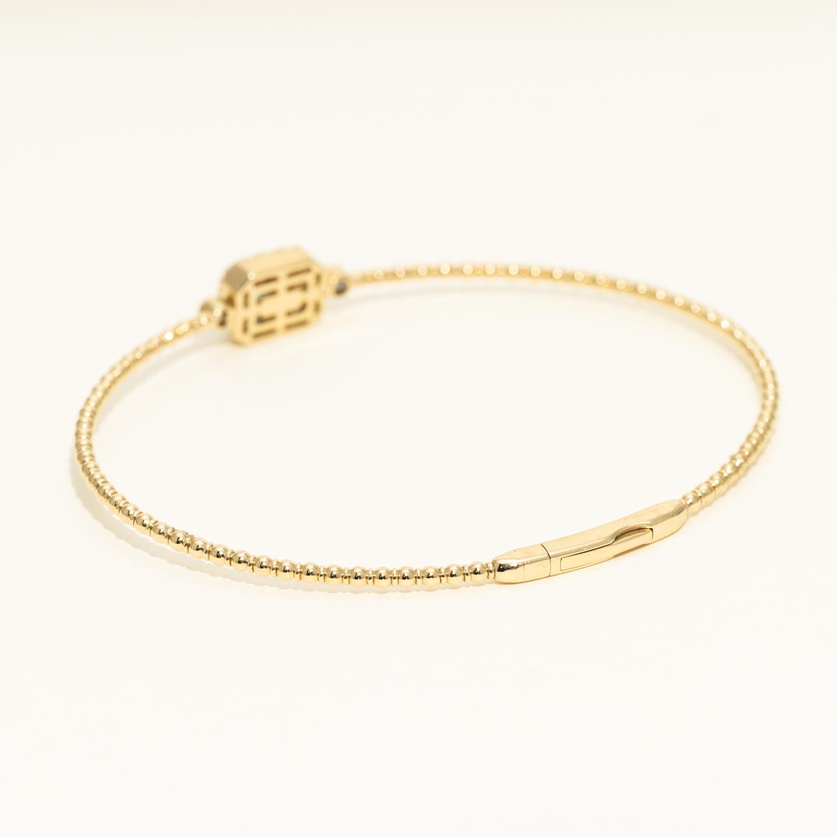 Emerald Cut Emerald Flexible Bangle Bracelet in 14kt Yellow Gold with Diamonds (1/3ct tw)