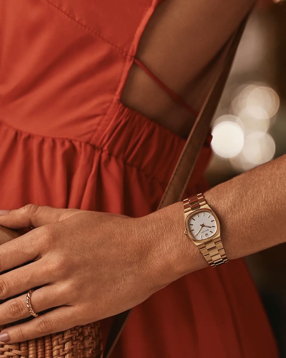 Bulova Super Seville Mini Watch with White Dial and Gold Toned Stainless Steel Bracelet (25mm and quartz movement)