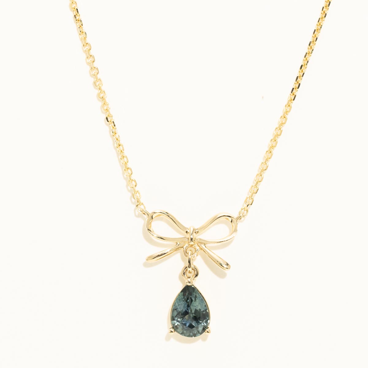 Parlé Pear Shape Montana Sapphire Bow Necklace in 14kt Yellow Gold