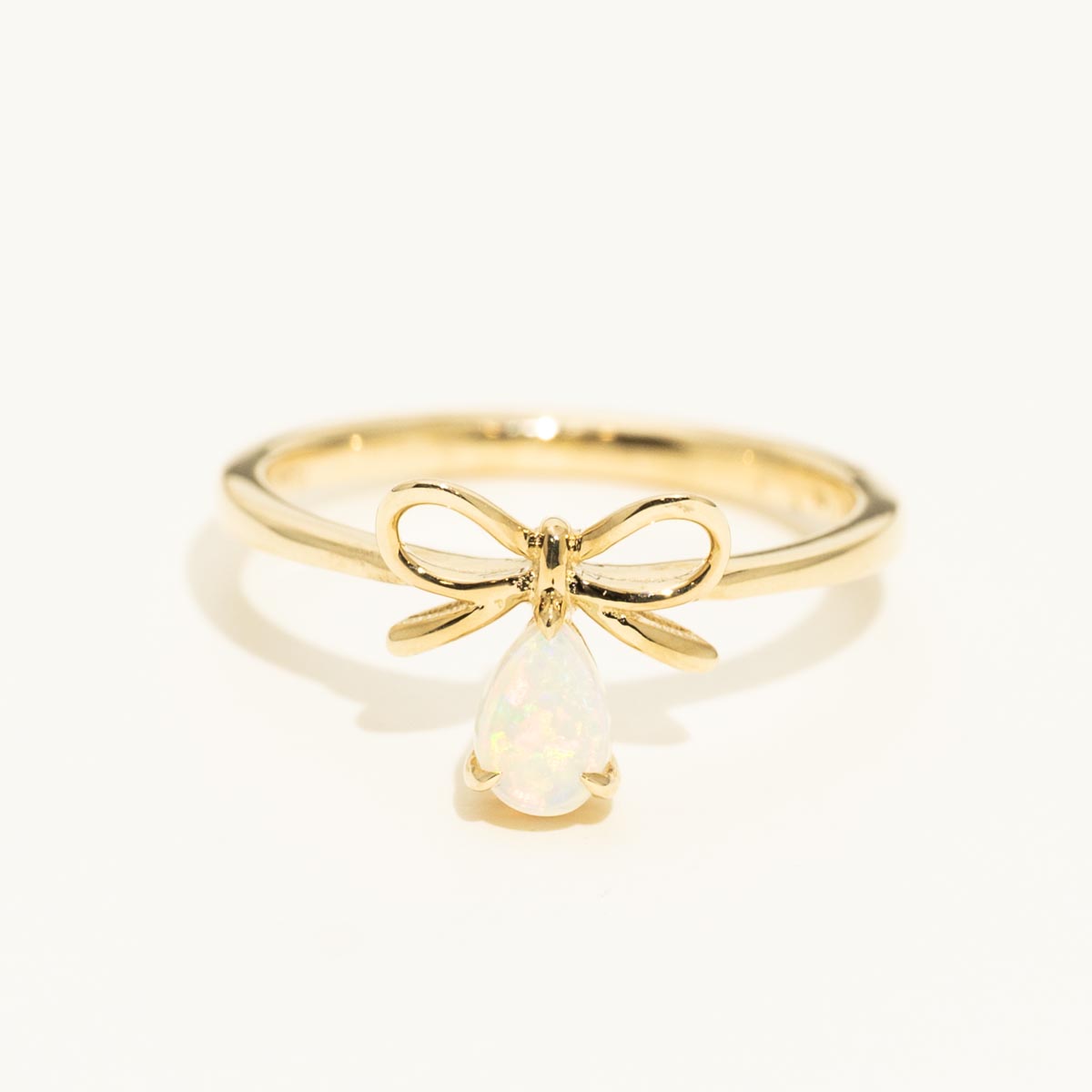 Parlé Pear Shape Australian Opal Bow Ring in 14kt Yellow Gold