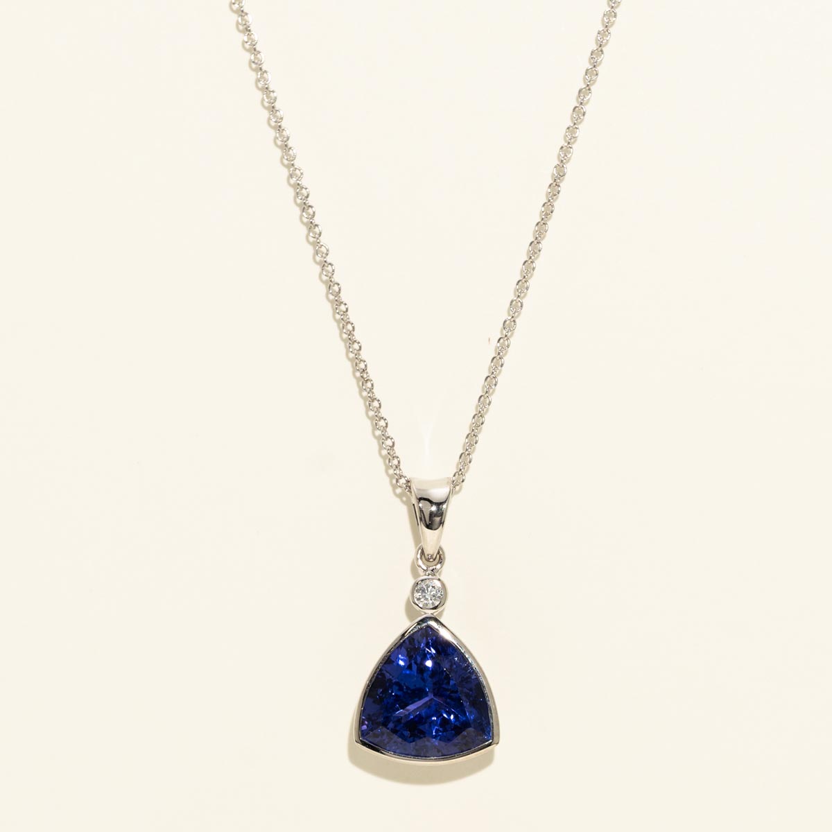 Trillion Cut Tanzanite Necklace in 18kt White Gold with Diamonds (.03ct tw)